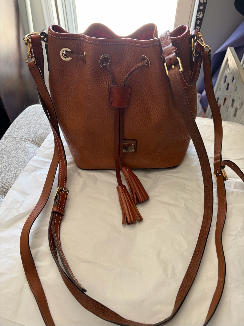 Dooney & Bourke Brown Leather Tassel Drawstring Bucket Crossbody